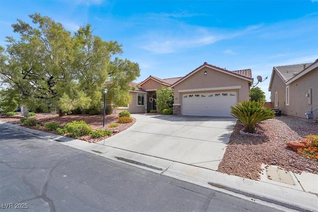 8608 Willow Cabin St, Las Vegas, NV 89131 - view of front facade with concrete driveway, stucco siding, an attached garage, a tiled roof, and stone siding