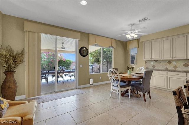 8608 Willow Cabin St, Las Vegas, NV 89131 - dining area with ceiling fan, baseboards, and light tile patterned flooring