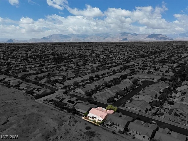 8608 Willow Cabin St, Las Vegas, NV 89131 - aerial view of residential area with a mountain backdrop and property parcel outlined