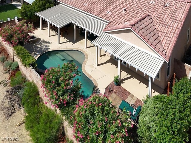 8608 Willow Cabin St, Las Vegas, NV 89131 - view of subject property featuring a pool