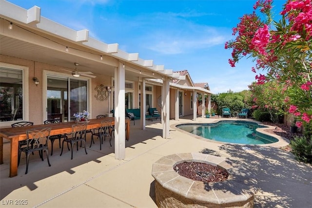 8608 Willow Cabin St, Las Vegas, NV 89131 - swimming pool with a patio, ceiling fan, and outdoor dining space