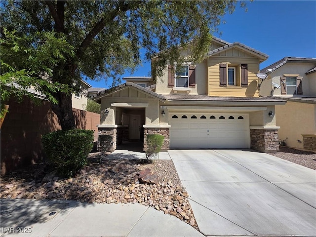 craftsman house with driveway, a garage, stucco siding, stone siding, and fence