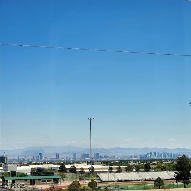 water view with nearby urban area and a mountain backdrop