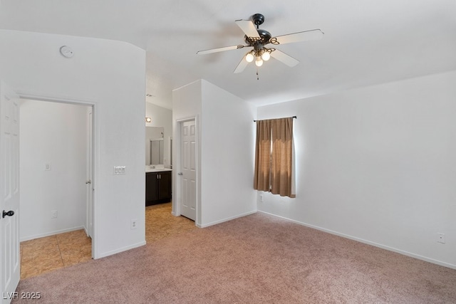 688 Castlebridge Ave, Las Vegas, NV 89123 - spare room with light colored carpet, ceiling fan, baseboards, and a smoke detector