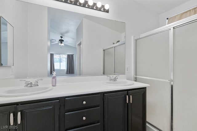 688 Castlebridge Ave, Las Vegas, NV 89123 - full bathroom with ceiling fan, double vanity, and a shower with door