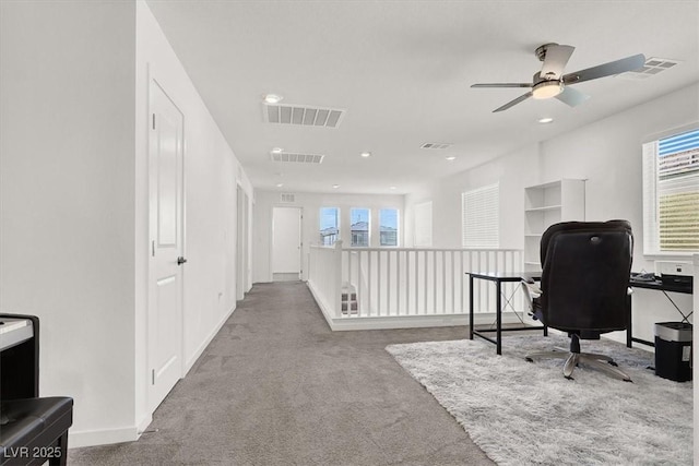 office area featuring carpet floors, a ceiling fan, recessed lighting, and baseboards