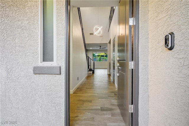 hall featuring stairs