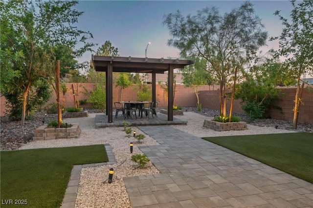 view of home's community with a patio