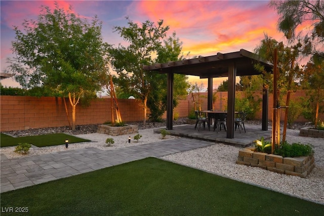 view of yard with a patio and outdoor dining area