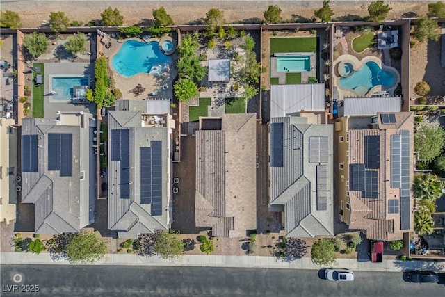 drone / aerial view of a pool area