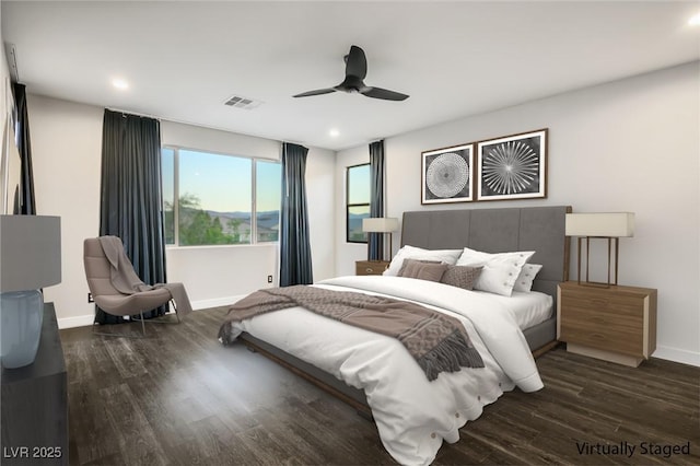 bedroom featuring wood finished floors, baseboards, recessed lighting, and a ceiling fan