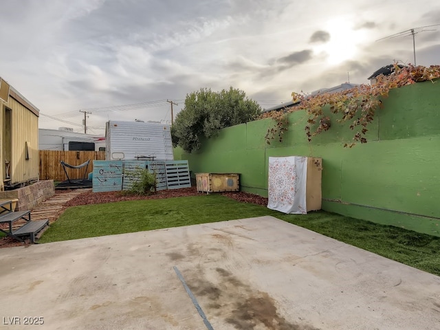 view of patio / terrace featuring fence