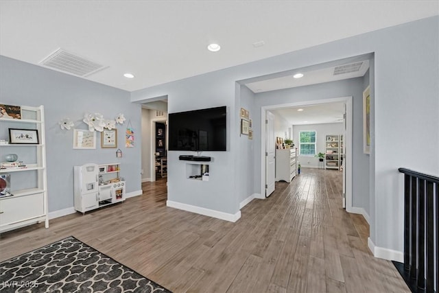 3171 Biccari Ave, Henderson, NV 89044 - living area with light wood finished floors, baseboards, and recessed lighting