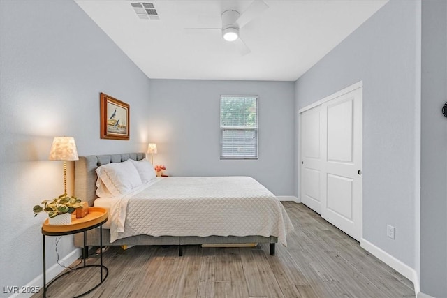 3171 Biccari Ave, Henderson, NV 89044 - bedroom with baseboards, wood finished floors, a ceiling fan, and a closet