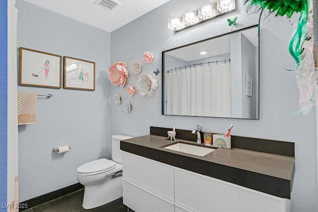 3171 Biccari Ave, Henderson, NV 89044 - full bath featuring toilet, baseboards, vanity, and tile patterned floors