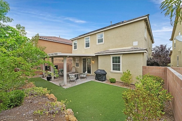 3171 Biccari Ave, Henderson, NV 89044 - back of property featuring stucco siding and a patio area