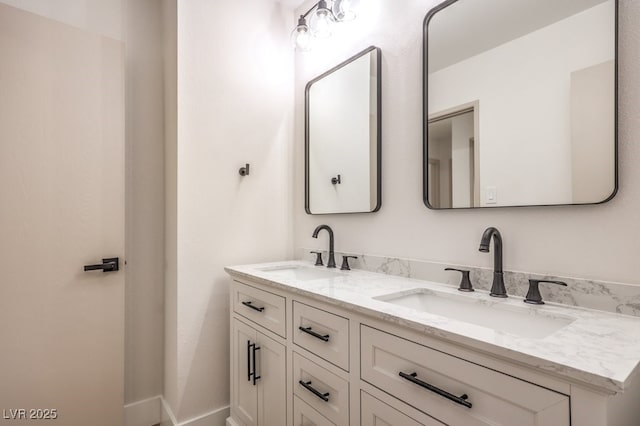 bathroom featuring double vanity