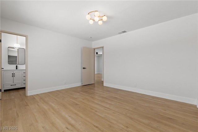 4450 San Rafael Ave, Las Vegas, NV 89120 - unfurnished bedroom featuring light wood finished floors and baseboards