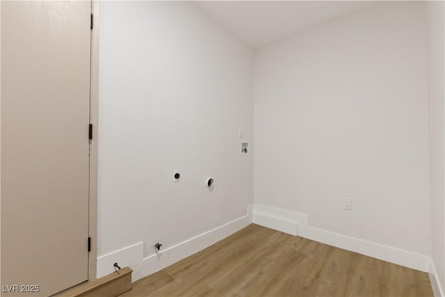 4450 San Rafael Ave, Las Vegas, NV 89120 - clothes washing area featuring electric dryer hookup, gas dryer hookup, washer hookup, light wood-type flooring, and baseboards