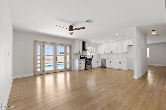 4450 San Rafael Ave, Las Vegas, NV 89120 - unfurnished living room featuring baseboards, light wood-style floors, a ceiling fan, french doors, and recessed lighting