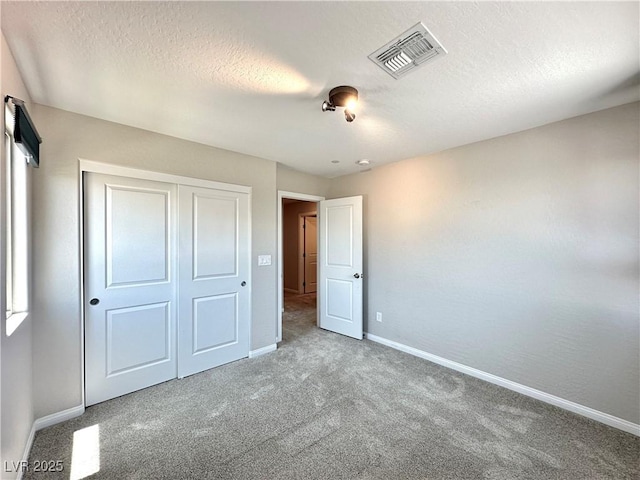 483 Fairview Hills St, Las Vegas, NV 89138 - unfurnished bedroom with carpet floors, a textured ceiling, and a closet
