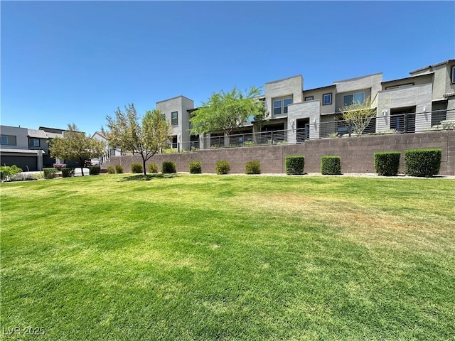 483 Fairview Hills St, Las Vegas, NV 89138 - surrounding community with a residential view and a lawn