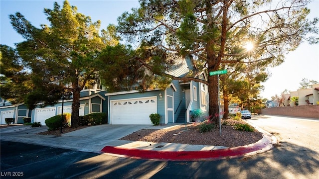 view of front facade with driveway and a garage