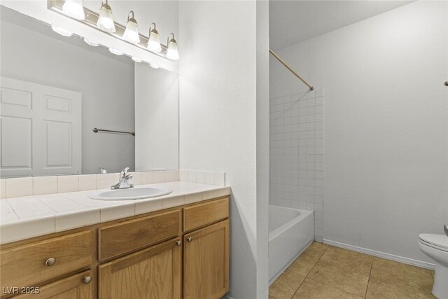 5250 S Rainbow Blvd Unit 2106, Las Vegas, NV 89118 - full bath featuring toilet, tile patterned floors, vanity, and tub / shower combination