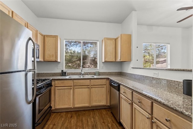 5250 S Rainbow Blvd Unit 2106, Las Vegas, NV 89118 - kitchen with stainless steel appliances, a sink, dark wood-style floors, ceiling fan, and light brown cabinetry