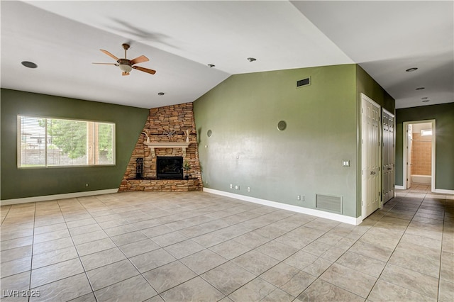 unfurnished living room featuring a ceiling fan, tile patterned floors, lofted ceiling, and healthy amount of natural light