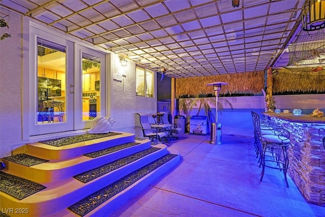 view of patio featuring fence and a pergola