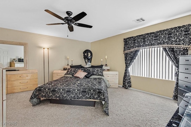 bedroom with carpet and a ceiling fan