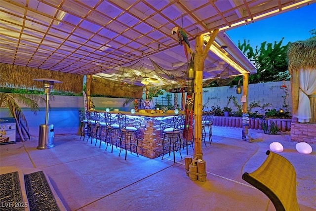 view of patio / terrace featuring fence