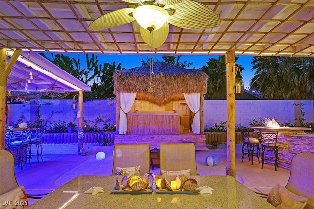 view of patio / terrace featuring a fenced backyard and ceiling fan