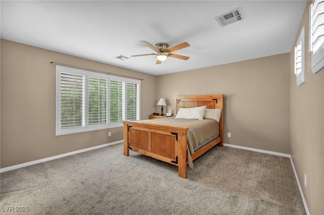 9893 Santa Ponsa Ct, Las Vegas, NV 89178 - carpeted bedroom with baseboards and a ceiling fan