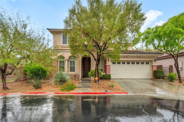 9893 Santa Ponsa Ct, Las Vegas, NV 89178 - view of front of home with fence, stucco siding, concrete driveway, and an attached garage
