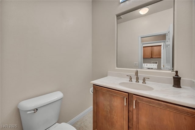 9893 Santa Ponsa Ct, Las Vegas, NV 89178 - half bathroom with vanity, toilet, and baseboards