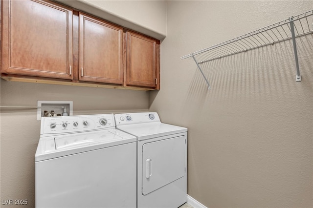 9893 Santa Ponsa Ct, Las Vegas, NV 89178 - laundry room with cabinet space and independent washer and dryer