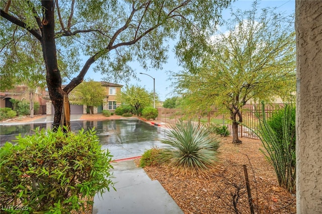 9893 Santa Ponsa Ct, Las Vegas, NV 89178 - view of yard with fence