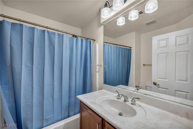 9893 Santa Ponsa Ct, Las Vegas, NV 89178 - full bathroom featuring vanity and shower / bath combo with shower curtain