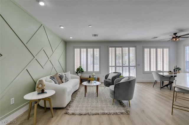 10389 Felice Ave, Las Vegas, NV 89135 - living area featuring baseboards, light wood finished floors, ceiling fan, and recessed lighting