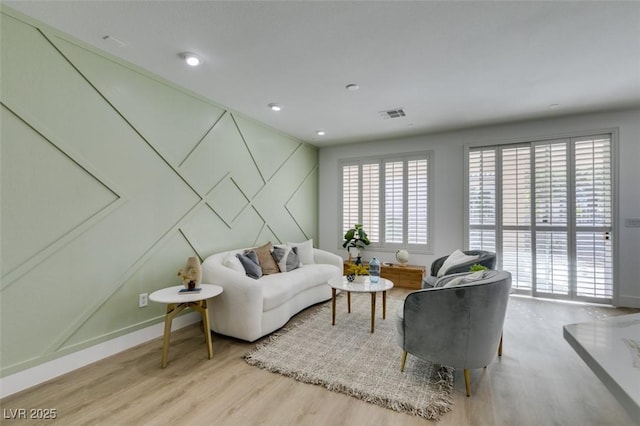 10389 Felice Ave, Las Vegas, NV 89135 - living room with light wood-style floors, baseboards, and recessed lighting