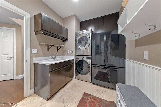 2113 Waterbury Ln, Las Vegas, NV 89134 - washroom with stacked washer / drying machine and light tile patterned flooring