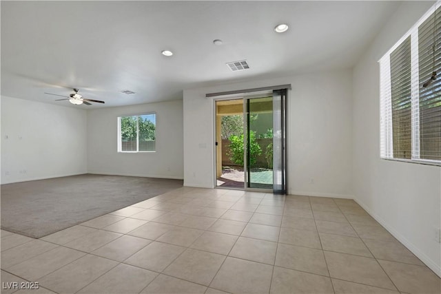 unfurnished room featuring light tile patterned floors, ceiling fan, light carpet, recessed lighting, and baseboards