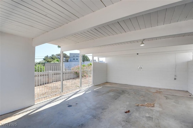 garage with fence