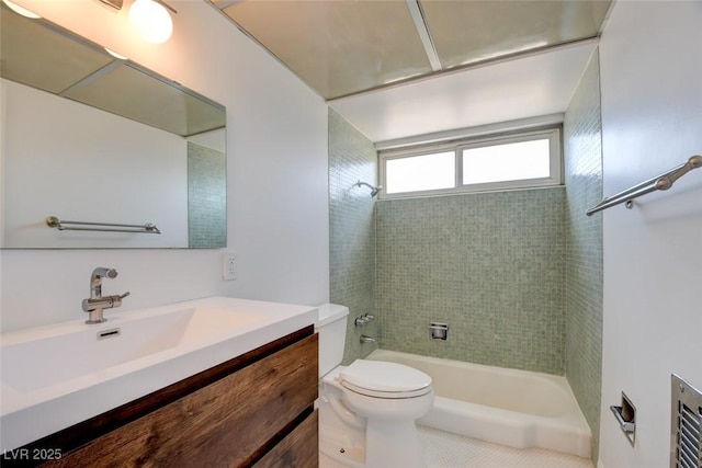 bathroom featuring toilet, bathing tub / shower combination, vanity, and tile patterned flooring