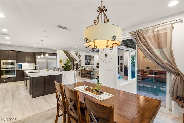 4505 Amazing View St, Las Vegas, NV 89129 - dining room with stairs and recessed lighting