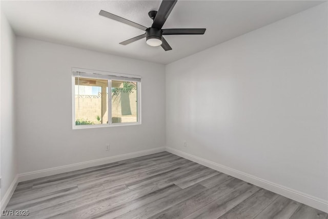 326 Fuente Dr, Henderson, NV 89014 - unfurnished room with light wood-style flooring, baseboards, and a ceiling fan
