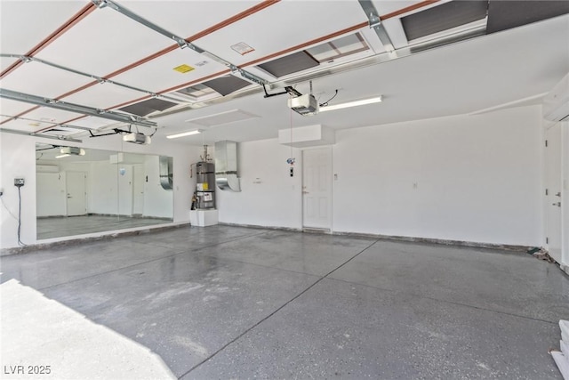326 Fuente Dr, Henderson, NV 89014 - garage featuring water heater and a garage door opener