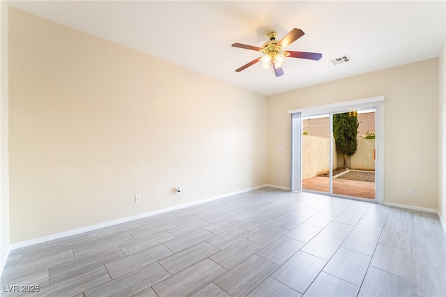 9289 Mandeville Bay Ave, Las Vegas, NV 89148 - spare room with a ceiling fan, baseboards, and wood finish floors